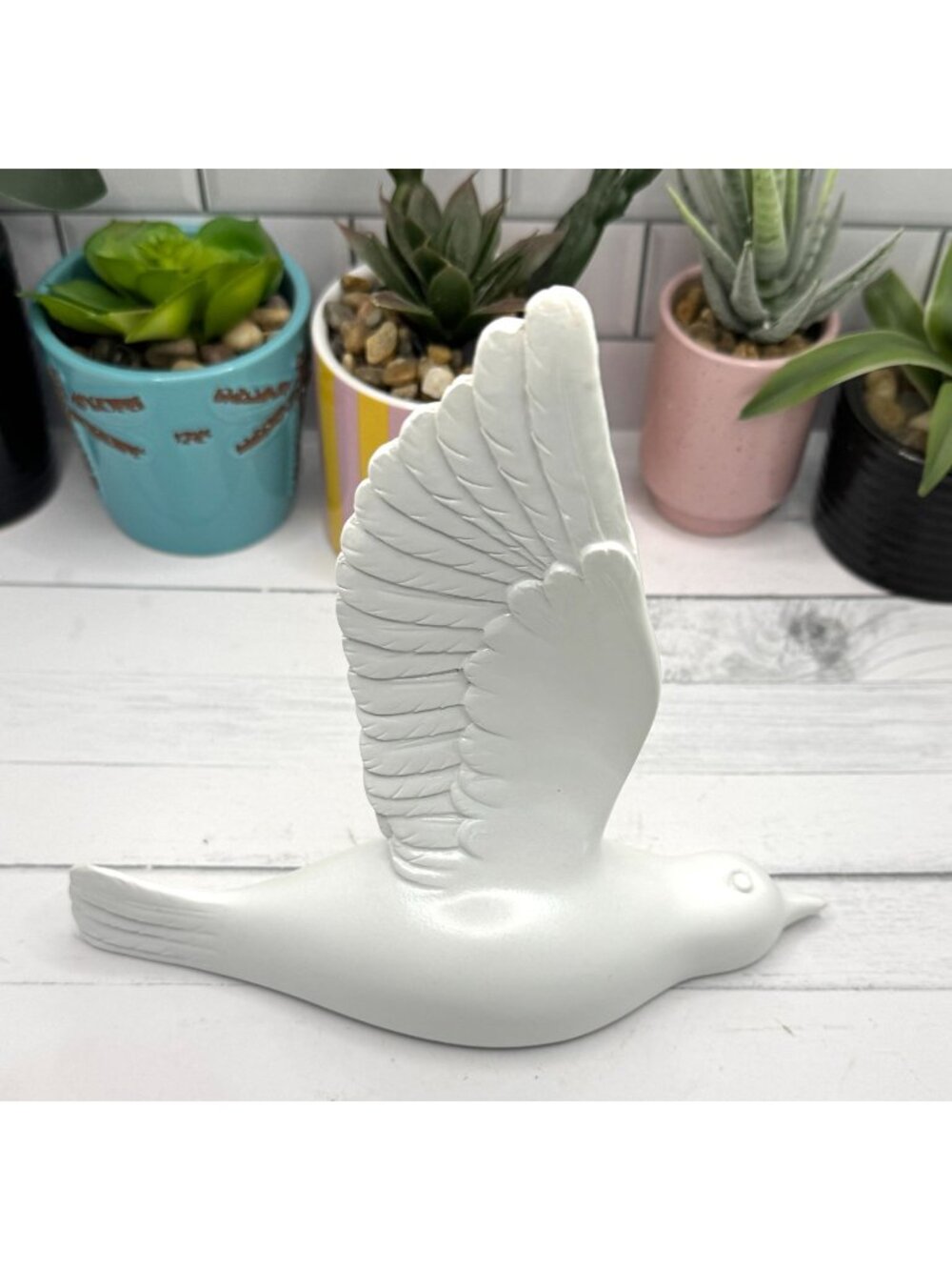 White Ceramic Bird Figurine With Raised Wing